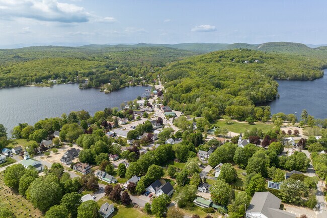 Homes in Harrison offer small‑town charm near Long Lake and Crystal Lake.