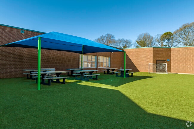 Outdoor dining and play area for Beverly Woods Elementary School students.
