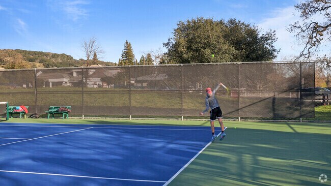 Serve up joy at the tennis courts of Maxwell Farms Regional Park.
