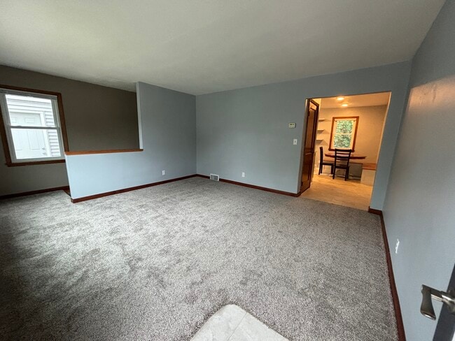 Living Room with stairway to basement