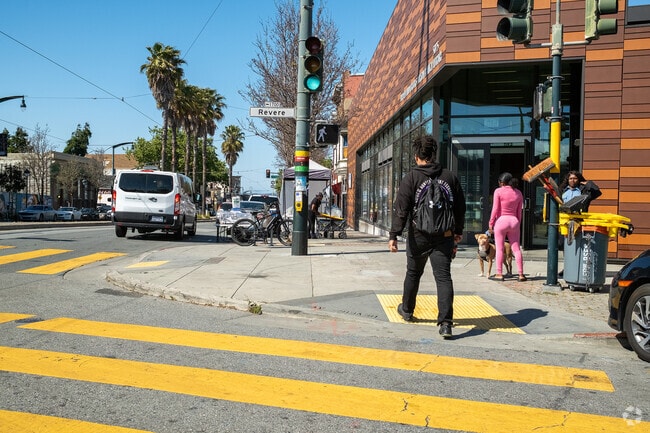 Bayview residents passing the local library and a pop-up friend chicken spot.