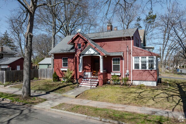 A corner Cape along W Elm St in Westville.