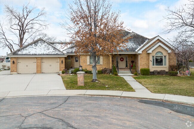 A ranch home in Cascade neighborhood combines timeless design with a two-car garage.