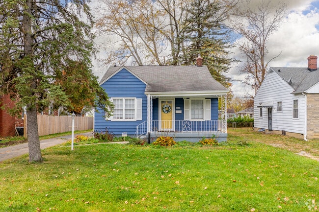 Some minimal traditional homes in Forest Manor have driveways with detached garages.