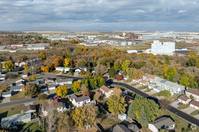 Riverside is framed by the Sheyenne River on one side and industrial buildings on the other.