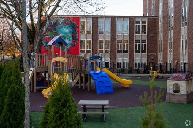 A colorful playground is outside of YWCA Early Education and Care Program in Worcester.