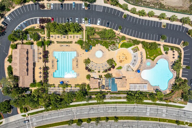 The Rosena Ranch Clubhouse features a gym, pools, and event space for residents.