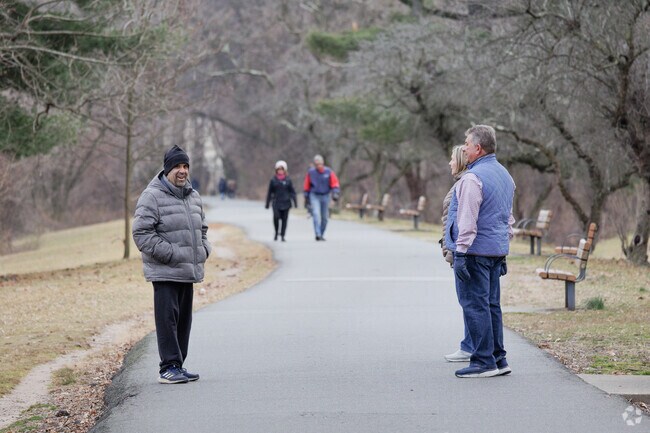 These locals take a moment to say hello to friends at Saddle River County Park in Saddle Brook.