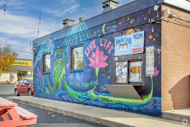 Vibrant murals brighten Cortland’s local businesses with artistic flair.