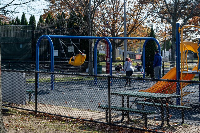 Families enjoy the playground at Ellsworth W. Allen Park in South Farmingdale.