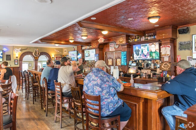 Sharky’s Wings & Raw Bar is a local hotspot renowned for its unmatched popularity and vibrant atmosphere in Alpha.