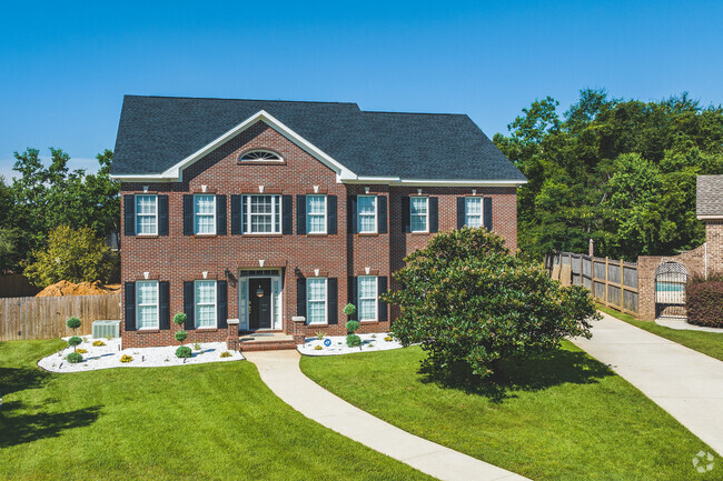 Some homes in Westhill are larger, traditional brick builds.