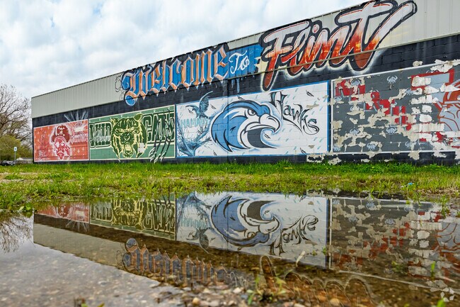 Many of the older buildings throughout Brownell sport colorful murals celebrating local culture.