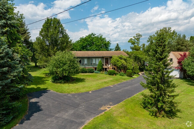 Ranch style homes with long driveways are very common in the Northwest Ithaca neighborhood.