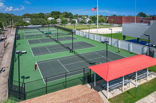 Practice your swing at one of the many tennis courts at Burke High School.
