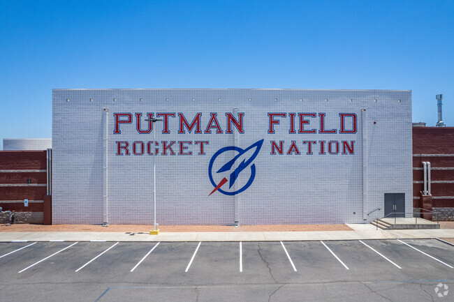 Admire the captivating Putman Field mural on the wall of Moon Valley High School in Phoenix.