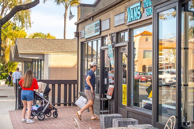 The Village is lined with a mix of surf shops, boutiques, and local gems—each offering everything from handcrafted boards and beachwear to art, gifts, and laid-back coastal essentials.