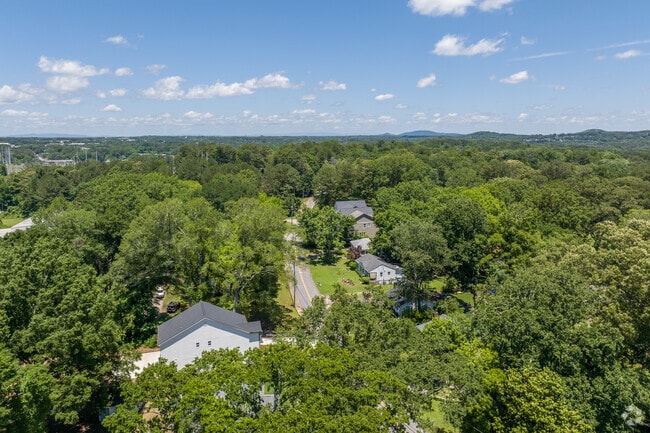 Austin's lush greenery and canopy covered streets offer a sense of privacy. and peace in this residential pocket of Marietta.