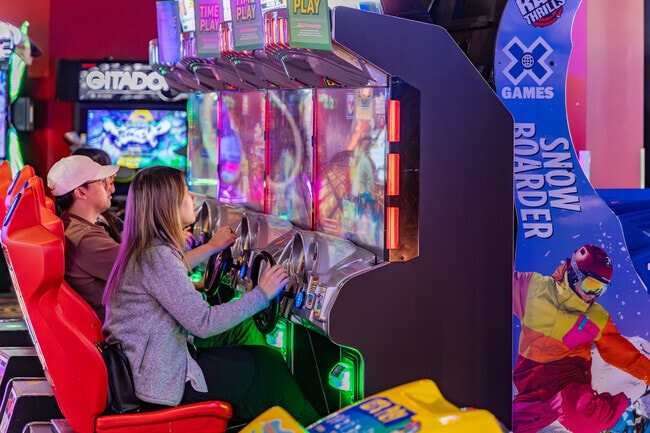 Compete with your friends playing arcade games at Round1 Bowling.