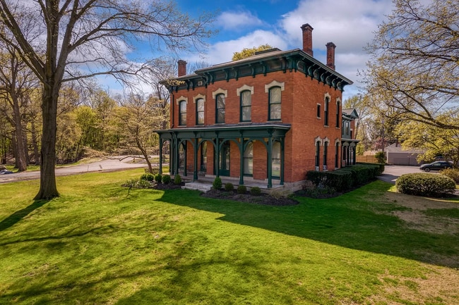 Front of Historical Building with Private Parking Lot