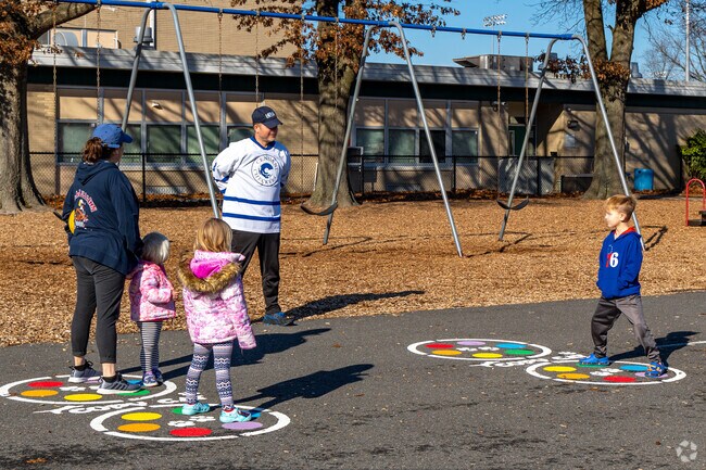 Play educational games outside at the Eleanor Rush Intermediate School's playground.