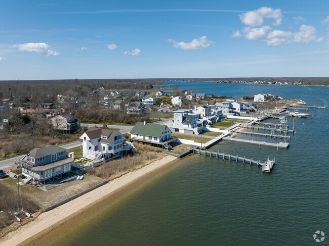 This quiet residential community sits right on Narrow Bay.