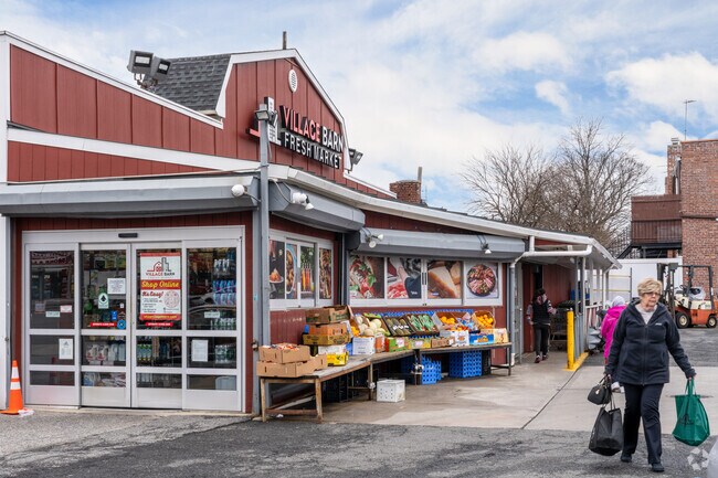 Village Barn Fresh Market offers convenience Middle Village locals for daily needs.