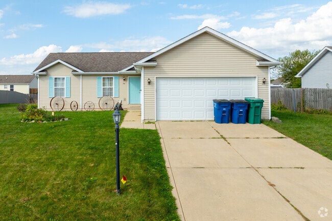 A ranch-style home in Westville offers single-level living and a convenient garage.