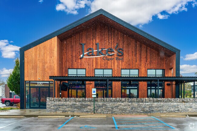 Brannon Crossing residents enjoy an afternoon at Jake's Cigar Bar, a popular spot featuring hundreds of bourbons and cigars.