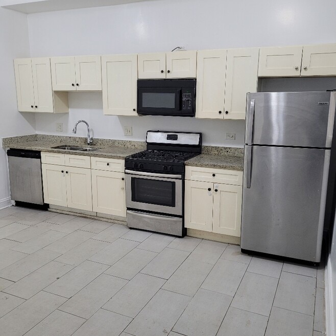 6751 S Clyde Ave unit Bsmt, Chicago, IL 60649 - photo 1