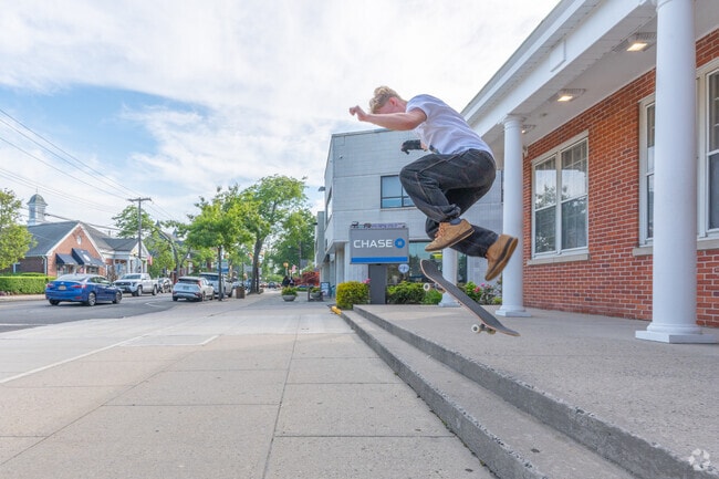 Many of Sayville's residents cycle and skateboard through its walkable downtown.