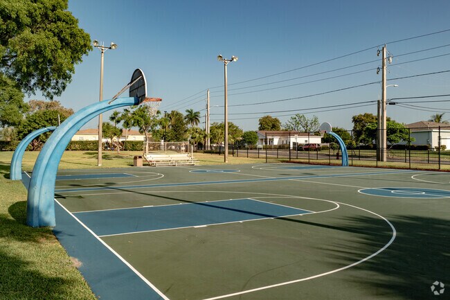 Locals meet for a game of basketball at Sara Sims Park in Heart of Boynton.