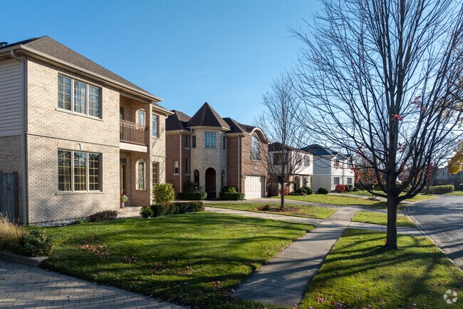 New Traditional homes are built in place of many homes in Emerson Place.