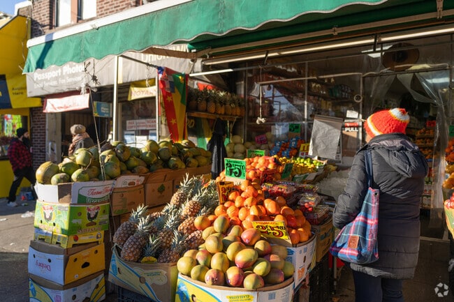 Colorful tropical fruits line the sidewalks of Flatbush.