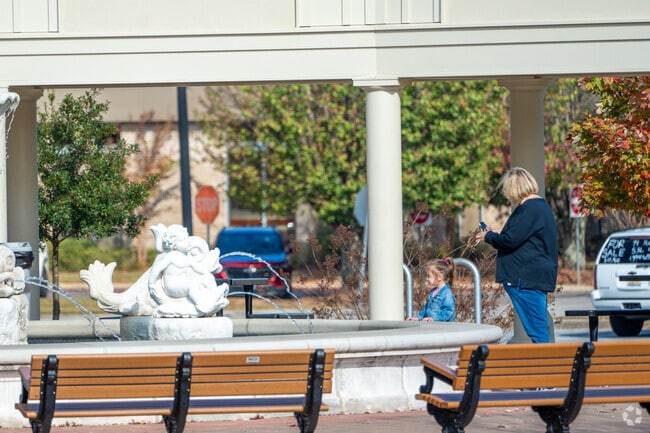 Check out the fountain with someone special at Old Mill Square Park near South Shelby.