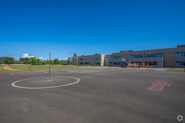 An expansive play area at Quatama Elementary School in Hillsboro, Oregon is open for recess.