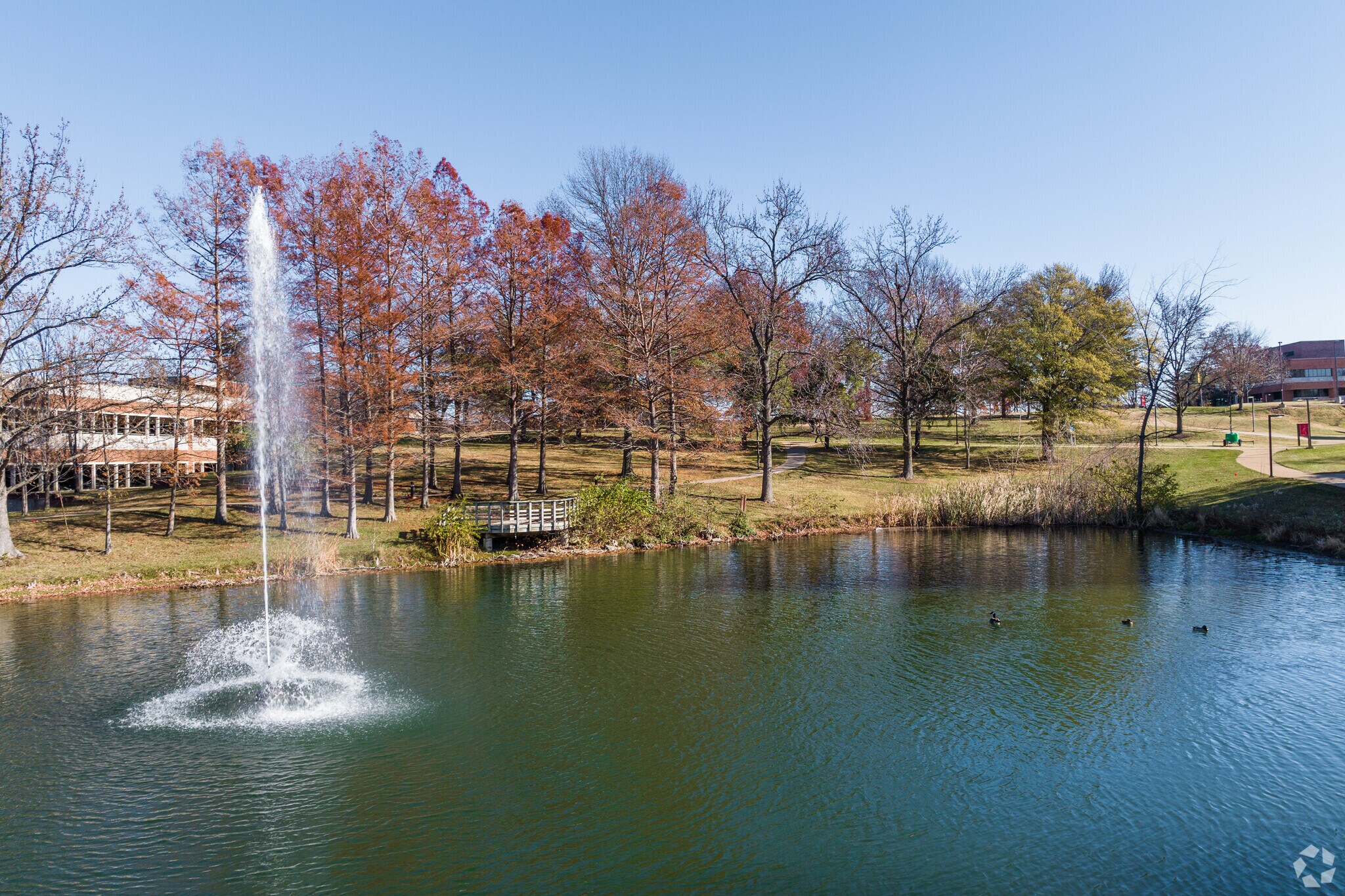 Enjoy scenic view of Bugg Lake near Velda Village Hills.