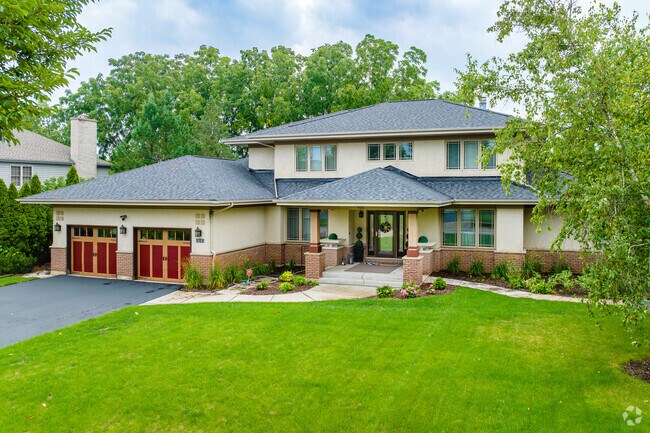 The streets of Far West Algonquin display sophisticated and modern custom builds.