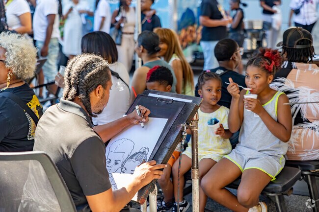 Caricature drawings are popular during the Sweet Auburn Springfest.