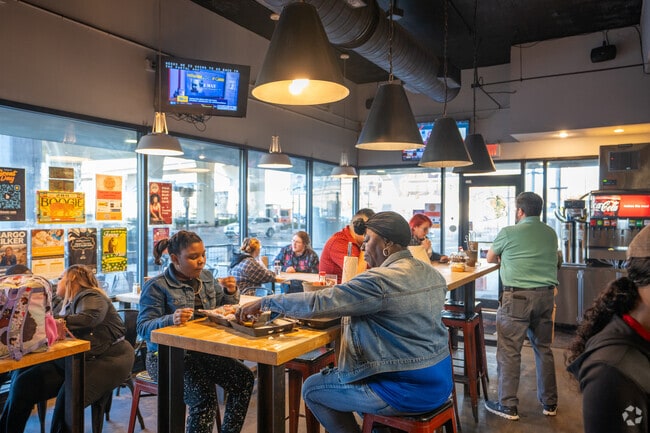 Dining options include Eugene's Hot Chicken.