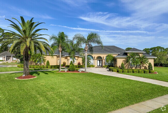 Well manicured lawns and large groups of palm trees are a welcoming site to Indigo residnets.