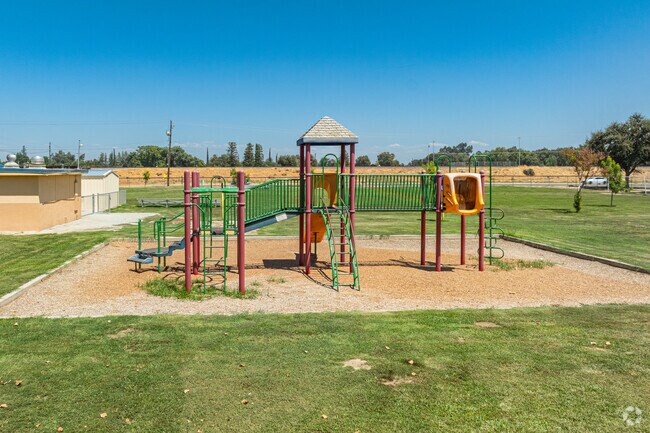 Laton Elementary School provides large green areas a play equipment for students to enjoy.