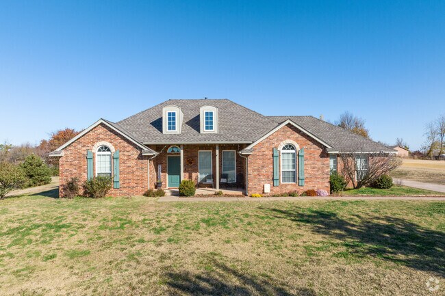 Cape Cod inspired ranch style homes dot the wide-open landscape of Bridge Creek.