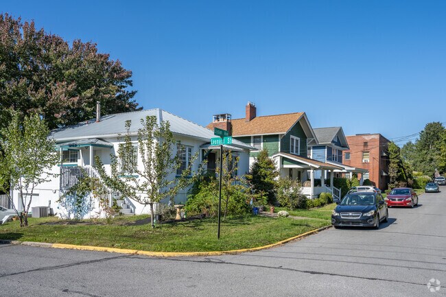 A row of homes sits close together along a street in Morgantown's First Ward.