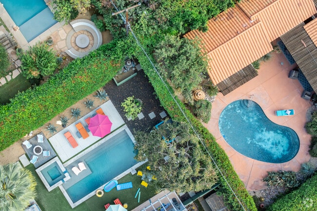 Many homes feature private pools to keep cool in Tahquitz River Estates.