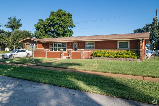 Small and simple ranch style homes are the norm here in Broward Estates in Ft. Lauderdale.