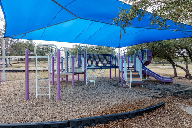 Covered playgrounds are perfect for students to enjoy on hot days.