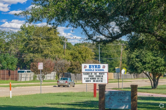 Byrd Middle School, Home of the Red Raiders, celebrates Coach Franklin on the welcome sign.