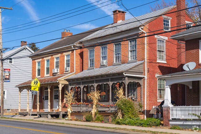 Dover residents love to decorate the porches of the old brick Colonial homes.