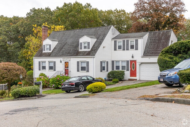 A Cape Cod-style home with a nice new addition in Woburn Country Club.